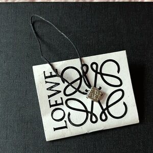 Loewe Lux Silver Logo Charm on Black Cord